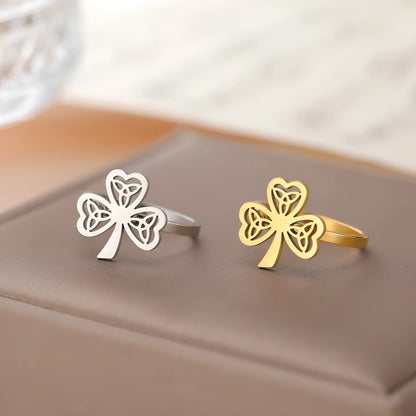Stainless steel lucky ring with hollow band in gold or steel colour finish.