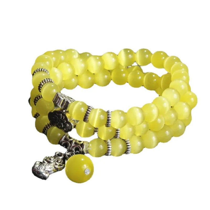 Women's opal crystal bracelet with lucky cat charm and geometric design, shown in blue colour option