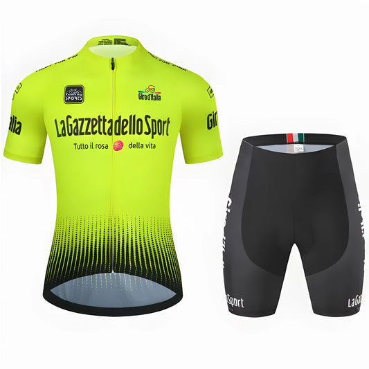 Loop short sleeve cycling suit in a patterned colour on a road bike, showing moisture-wicking fabric.
