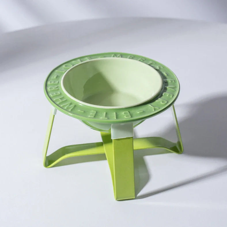 Ceramic cat bowl with iron anti-tip frame in blue colour with silicone pad