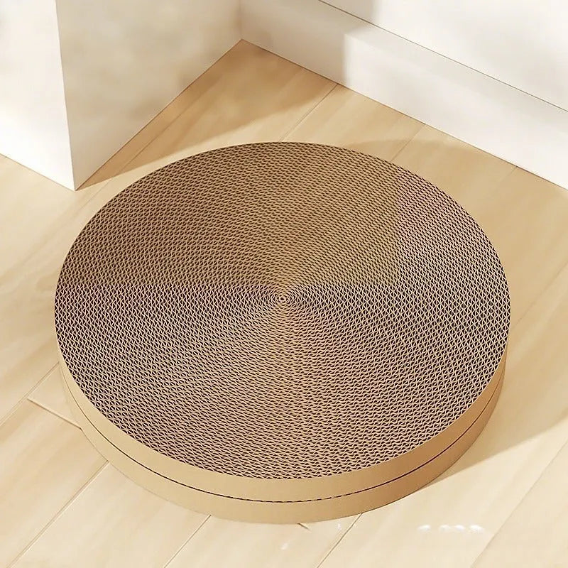 Round green cat scratching board measuring 55cm with corrugated paper surface and two replacement refills