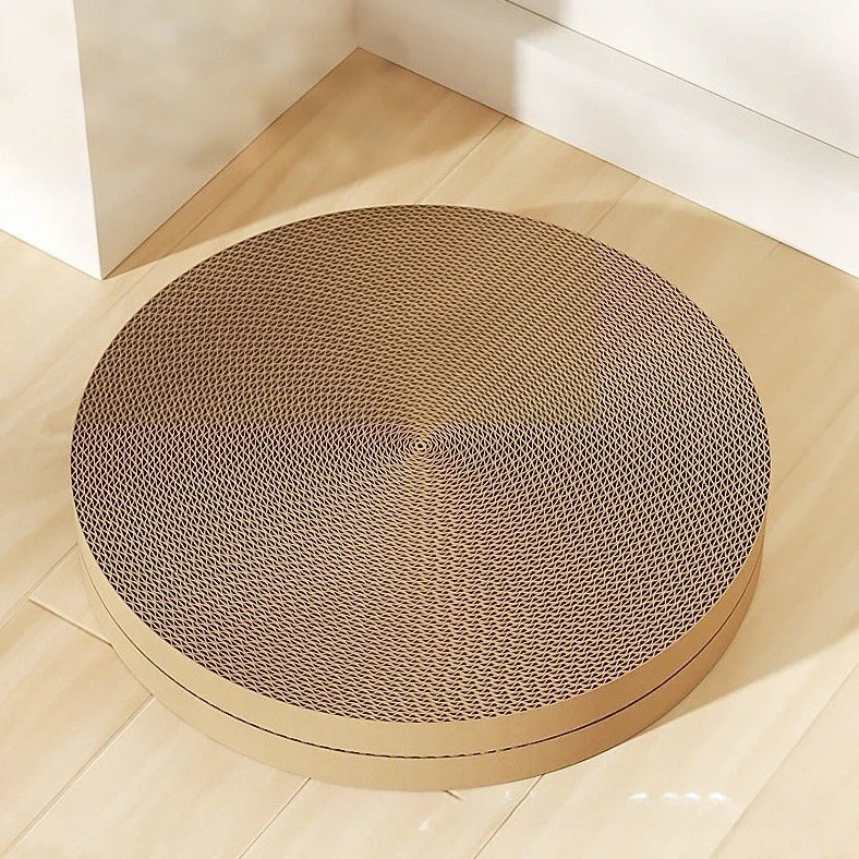 Green round cat scratching board measuring 55cm with corrugated paper surface and two replacement inserts