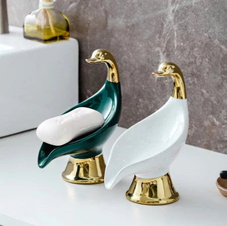 Ceramic swan soap rack in white and green with drainage cover