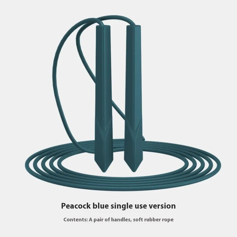 Blue PVC skipping rope with plastic handles on a grey background.