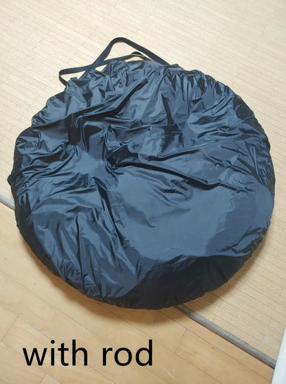 Black pop-up quick-throw car tail tent unfolded to a 200cm cube, set up behind an SUV.