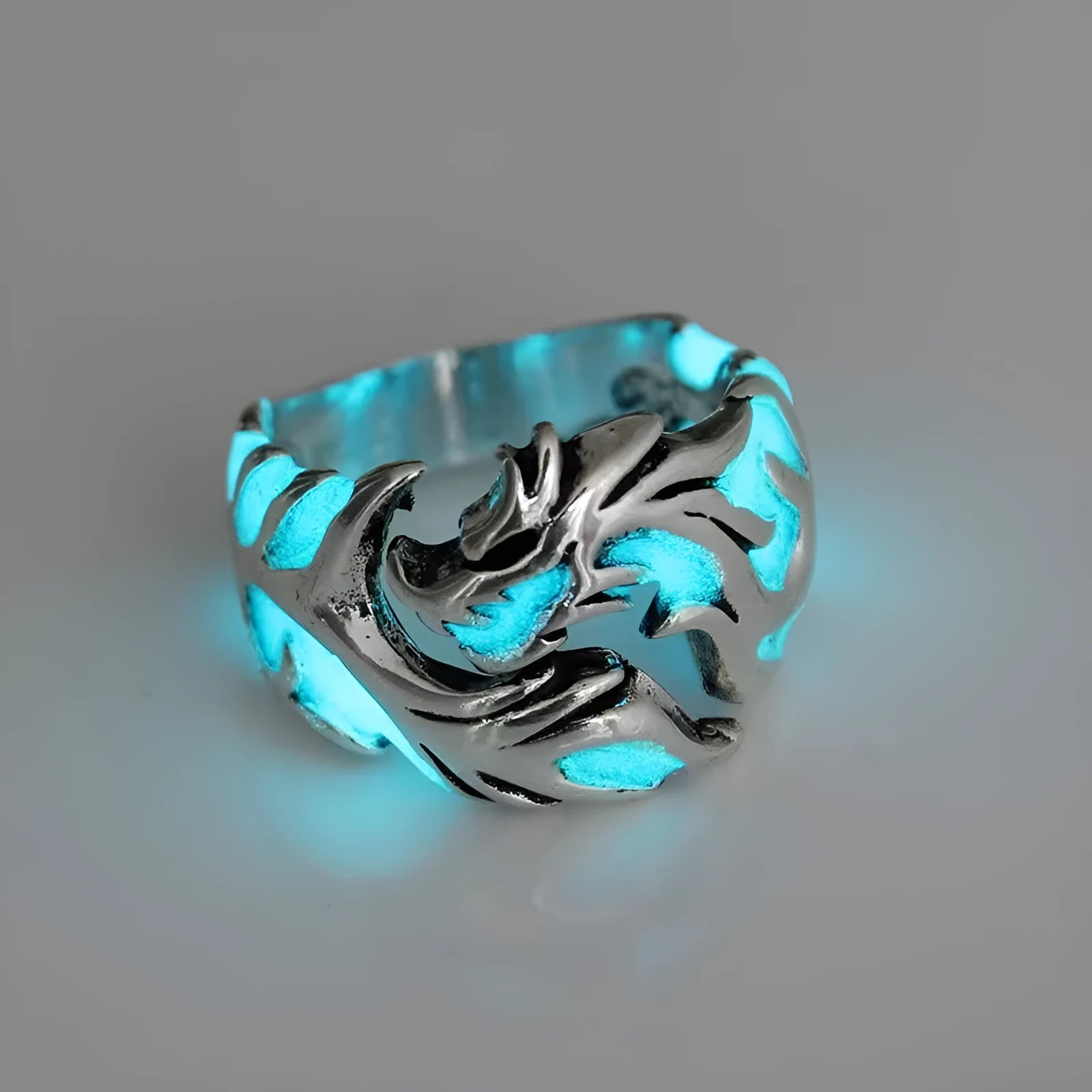 Adjustable Chinese style metal ring with a luminous dragon pattern in antique blue and green.