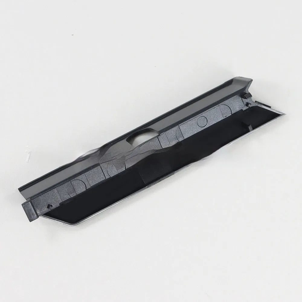 Black plastic hard drive baffle cover for a 3.5-inch internal hard drive bay.