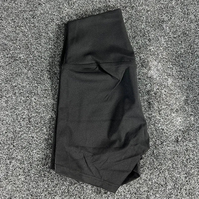 High-waisted yoga shorts in nylon fabric for moisture-wicking during sports, available in multiple colours and sizes.