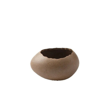 Oval porcelain egg shell bowl with underglaze finish, shown in large medium or small size and horizontal or vertical style.