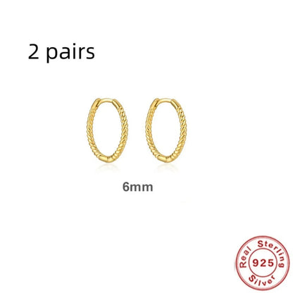 Sterling silver twisted string round ring earrings in gold or platinum colour.
