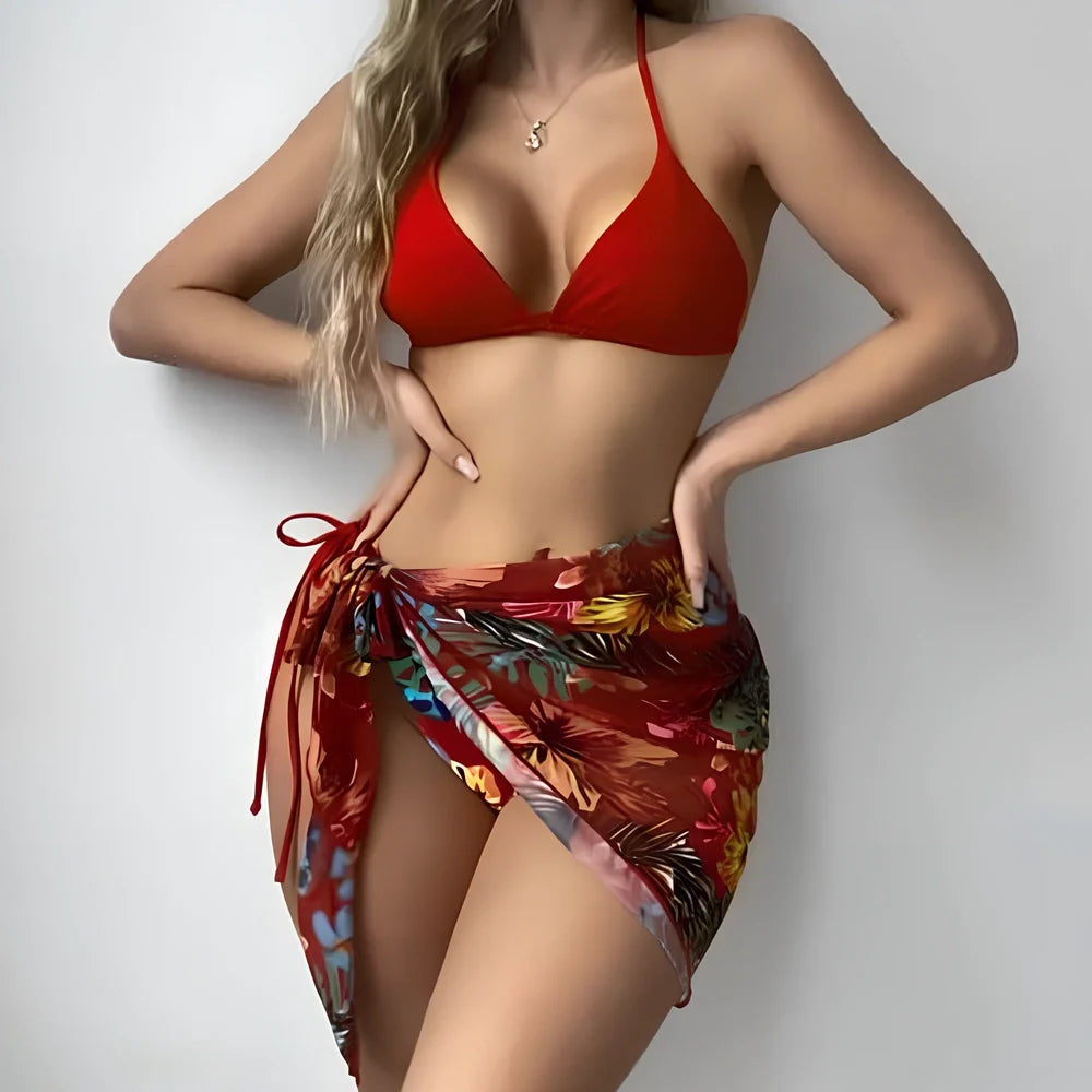 Women's three-piece swimsuit set with chest pad, panties, and yarn skirt in polyester fabric