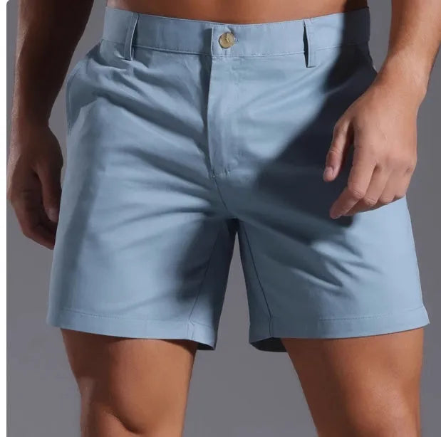 Men's solid colour cotton blend retro shorts in straight leg fit on a white background.