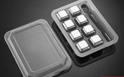 Set of eight stainless steel whiskey cooling stones with metal clip in plastic storage container