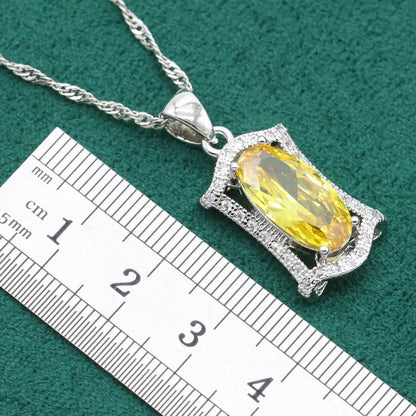 Women's yellow and olive alloy zircon jewellery set with necklace, earrings, ring, and bracelet on a snake bone chain.