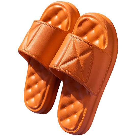 A pair of thick-soled EVA bathroom slippers in a selected colour, showing their injection-moulded non-slip design.