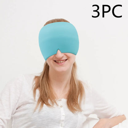 Black elastic gel headache relief mask laid flat showing eye contours and adjustable headband.