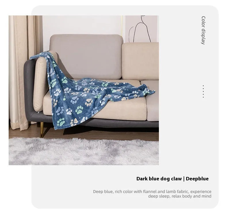 Blue dog cartoon print double-sided flannel pet blanket shown in a dog crate.