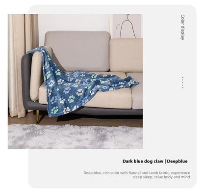 Blue dog cartoon print double-sided flannel pet blanket shown in a dog crate.
