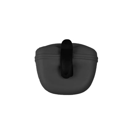 Black silicone dog training treat pouch with clip and magnetic closure shown attached to a belt.