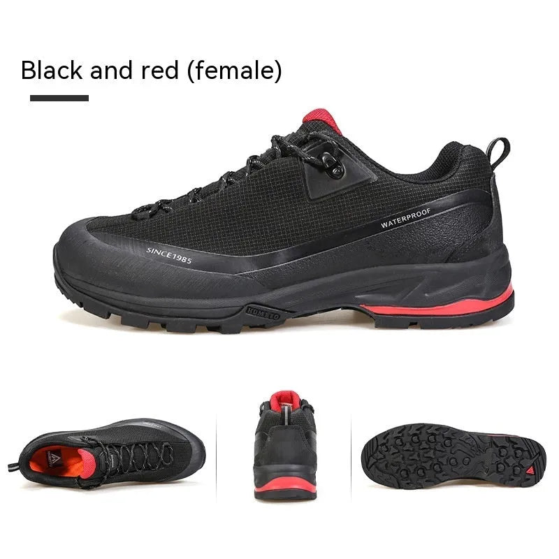 Men's low-top hiking boots in black with lace-up front and rubber outsole.