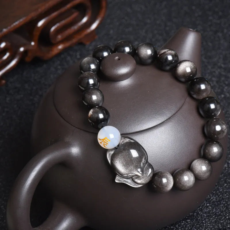 Natural obsidian beaded bracelet with 10mm stones in gold, silver, or black style.