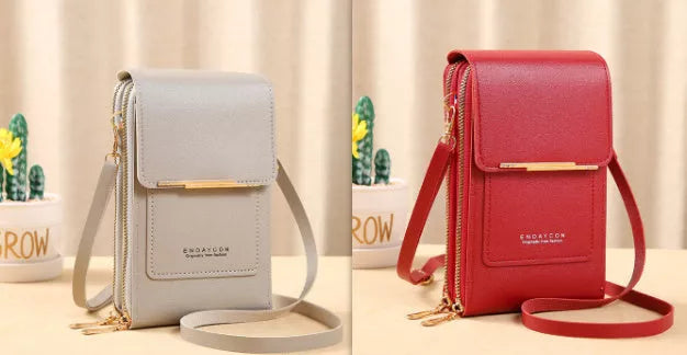 Women's messenger touch screen phone bag in solid colors with diamond decorative elements