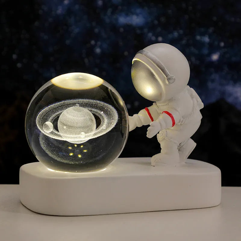 Astronaut crystal ball night light projecting galaxy pattern on 6cm resin sphere with USB cable