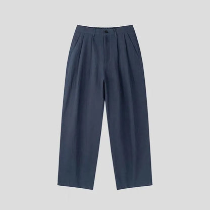 Men's apricot cotton linen trousers with elastic waistband and pencil leg opening on hanger