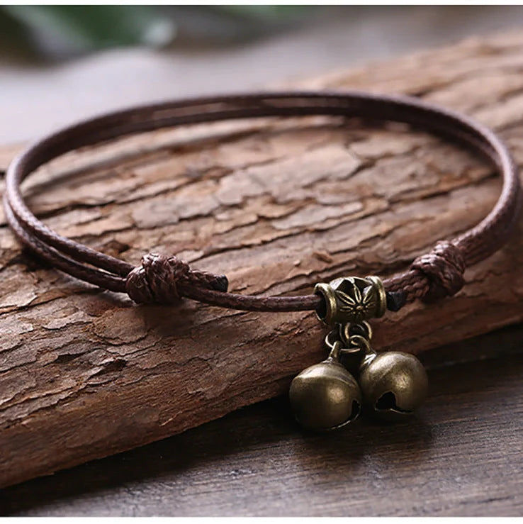 Adjustable nylon rope dog collar with brass bell in black, red, and coffee colour options