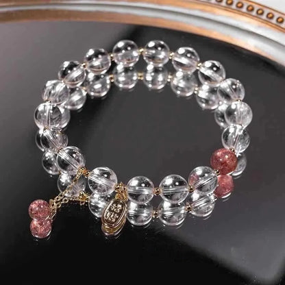 Handmade white crystal bracelet with 8mm beads and U-shaped design on wrist