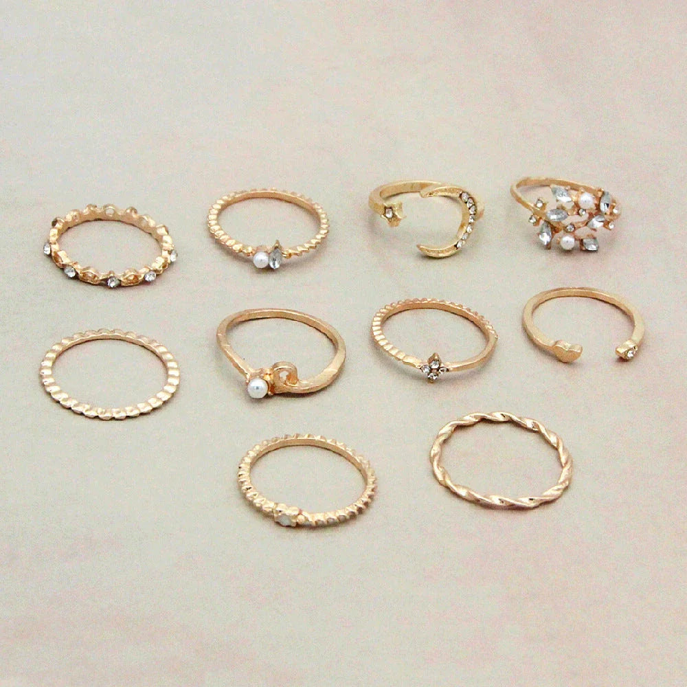 Enchanting gold-plated celestial-themed rings featuring stars, moons, and pearls
