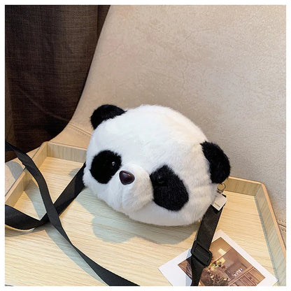 Plush panda head crossbody bag with cylindrical shape measuring 18x15x8cm, showing sandwich pocket and soft texture