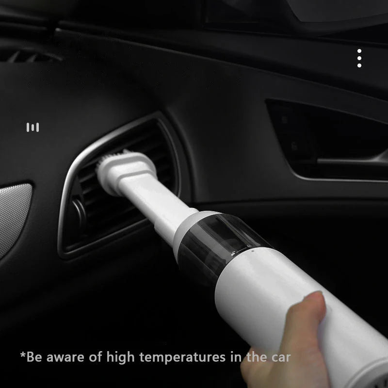 Mini car vacuum cleaner with wireless charging in black and white options