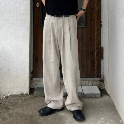 Army Green men's linen-style leisure trousers with a drawstring waist, laid flat.