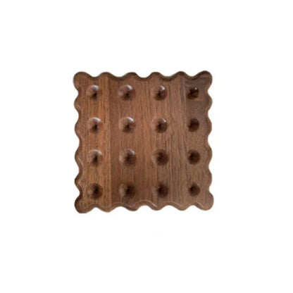 Elegant wooden coasters in various shapes and colors, serving as a versatile home accessory for dining and decor