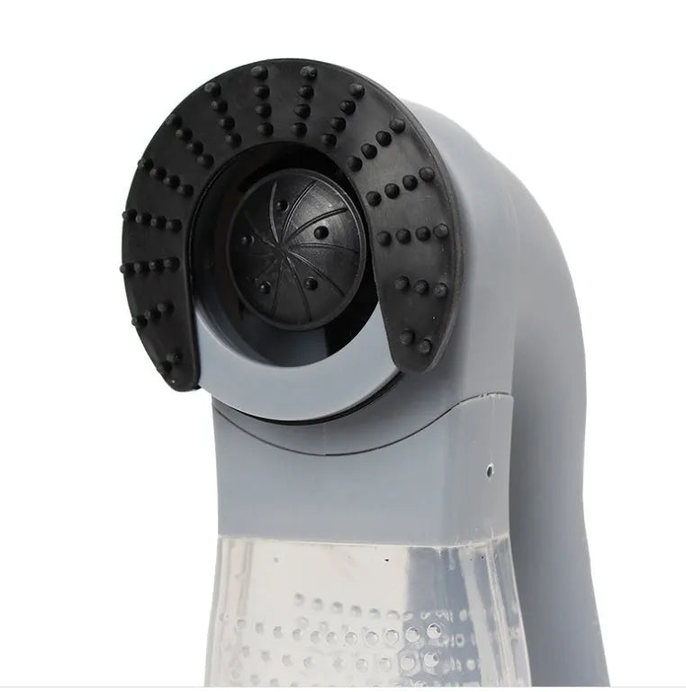 Grey portable pet hair vacuum cleaner with soft rubber head for grooming cats and dogs.