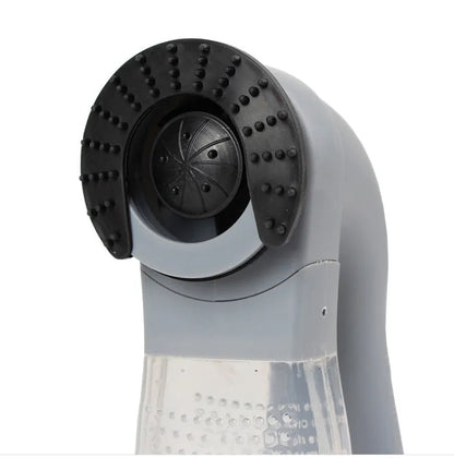 Grey portable pet hair vacuum cleaner with soft rubber head for grooming cats and dogs.
