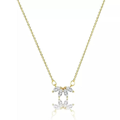 Minimalist lotus flower petal necklace in gold or silver, perfect for women and girls.