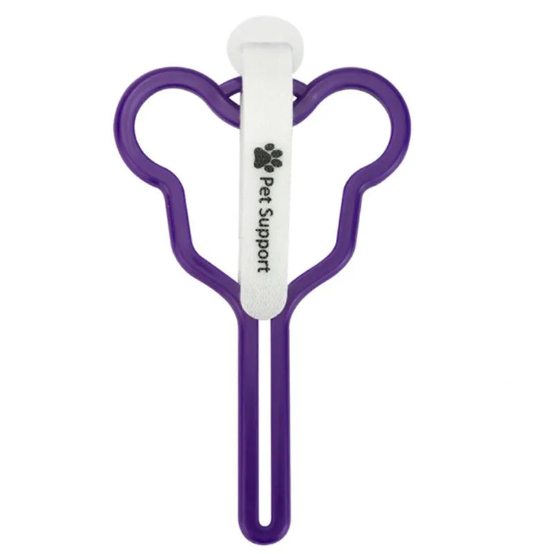 A dog poop bag dispenser with a hands-free clip and adjustable Velcro strap attached to a dog lead.
