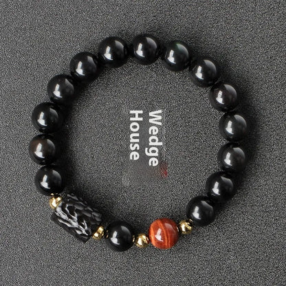 Handmade obsidian bracelet with 10mm red tiger eye beads, unisex retro design.
