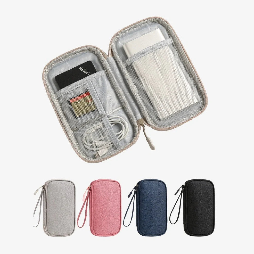 Light grey portable buggy bag for cable storage measuring 19x11x3cm with handbag-type shape