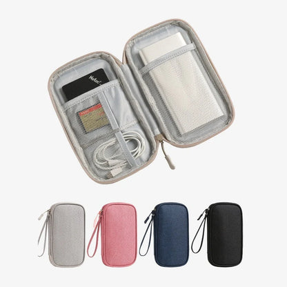 Light grey portable buggy bag for cable storage measuring 19x11x3cm with handbag-type shape