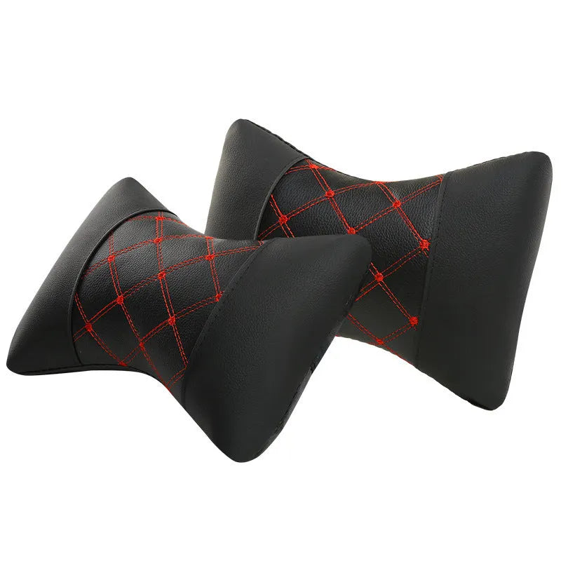 Leather quilted car headrest in black with blue lines, showing diamond check pattern and cervical neck support design.