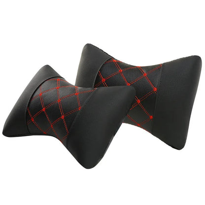 Leather quilted car headrest in black with blue lines, showing diamond check pattern and cervical neck support design.