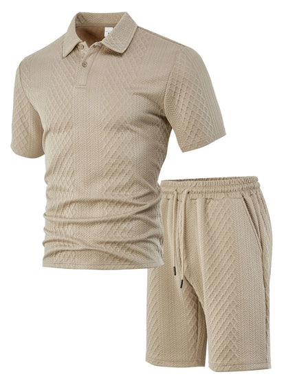 Men's patterned cloth casual suit set with short sleeve polo top and trousers on a hanger.