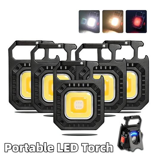 Black portable LED torch showing magnet, bottle opener, and multiple light modes with 500lm brightness