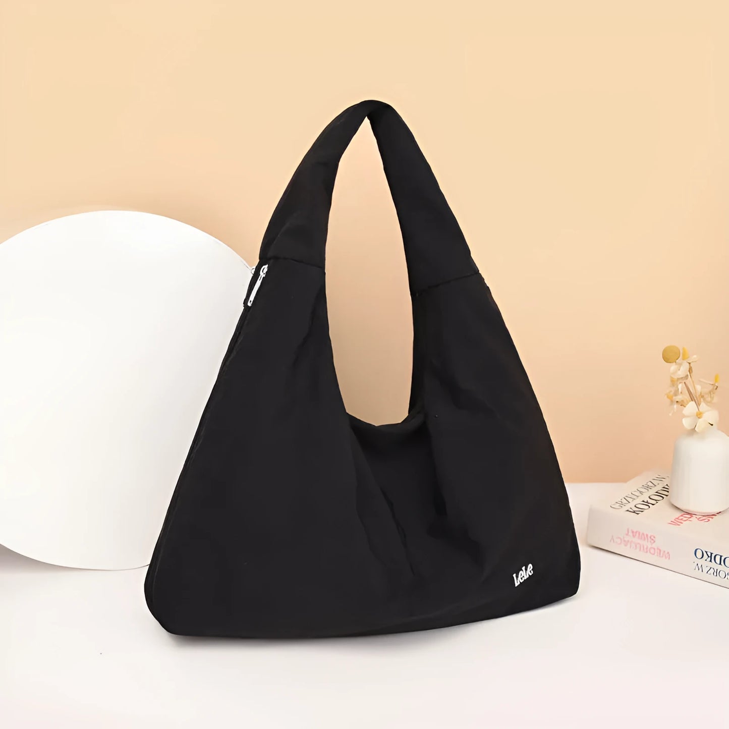 Heart-shaped soft nylon underarm shoulder bag for women in black, blue, khaki, or yellow.
