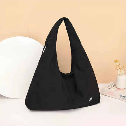Heart-shaped soft nylon underarm shoulder bag for women in black, blue, khaki, or yellow.
