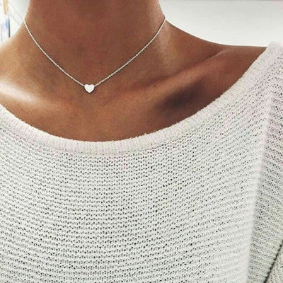 Elegant clavicle necklace with a double-sided love pendant, made of high-quality alloy for a timeless, fashion-forward look.