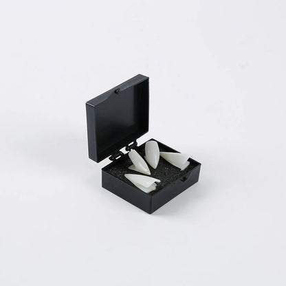 A pair of soft, flexible elf ears in various colors and sizes, perfect for Halloween costume accessories.